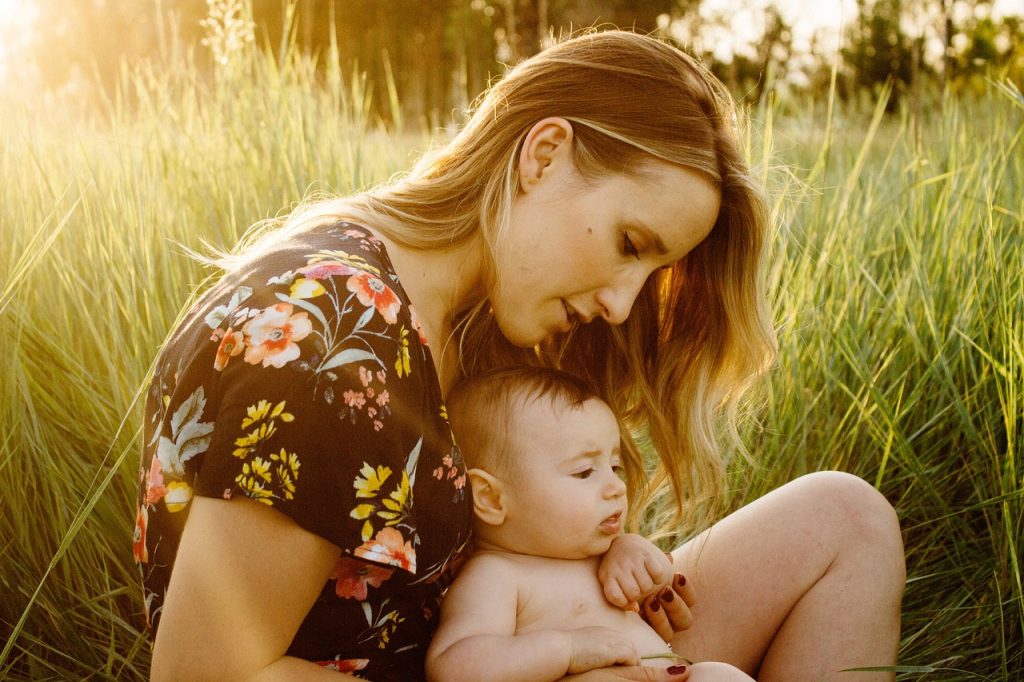 mother, baby, child, field, motherhood, parent, parenthood, infant, family, girl, grass, love, woman, sit, sitting, outdoors, happy mothers day, nature, portrait, golden light, mum, mom